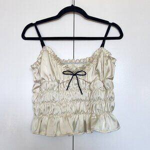 Cream satin ruched sleeveless ruffle crop top with black straps bow | Size L
